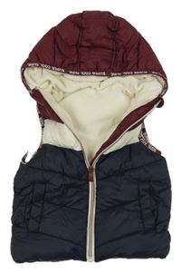 Tmavomodro-vínovová šušťáková prešívaná zateplená vesta s kapuíc Dunnes