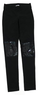 Čierne rifľové džegíny s překlápěcími flitre H&M