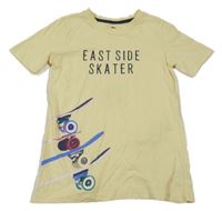 Svetložlté tričko so skateboardmi  a nápisom Tchibo