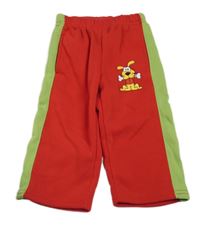 ČErveno-zelené tepláky s pejskem