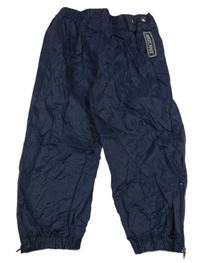 Tmavomodré šušťákové vodeodolné nohavice