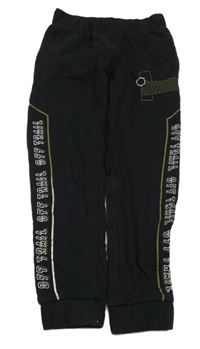 Černé tepláky s nápisy Destination 