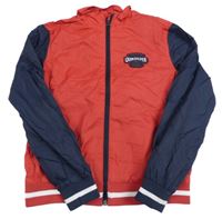 Červeno-tmavomodrý šusťákový podzimní bomber s nášivkou Quiksilver