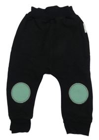 Čierno-zelené tepláky s kruhy