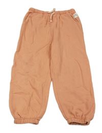 Broskvové tepláky Next