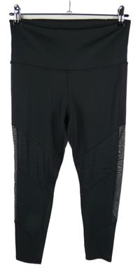 Dámské černé sportovní legíny s tylovými pruhy Reebok 