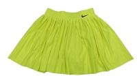 Neónově žltá športová plisovaná sukňa s všitými kraťasy Nike