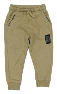 Béžové tepláky s nášivkou George