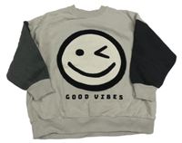 Sivá oversize mikina so smajlíkom a čiernymi rukávy Next