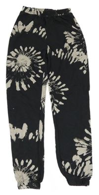 Antrcitovo-bílé vzorované tepláky H&M