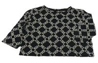 Čierne kárované crop tričko s nápismi Decathlon