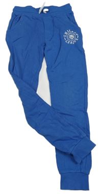 Modré tepláky s potiskem staccato