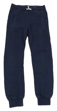 Tmavomodré tepláky s nápisom H&M