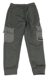 Sivé športové tepláky s vreckami McKenzie