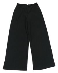 Čierne mačkané voľné é nohavice H&M