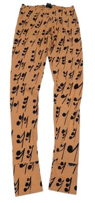 Oranžovo-čierne legíny s notami