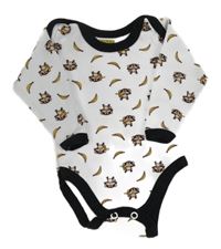 Biele body s černým lemem a opičkami