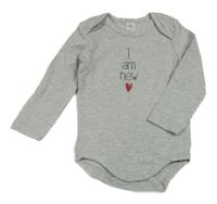 Šedé melírované body s nápisem Topomini