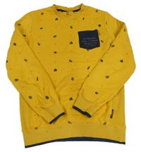 Okrová mikina s listami a vreckom