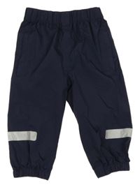 Tmavomodré šusťákové nepromokavé kalhoty F&F