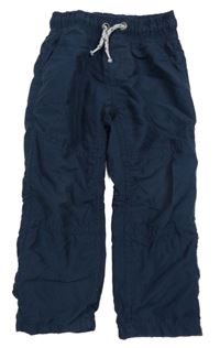 Tmavomodré šusťákové podšité kalhoty C&A