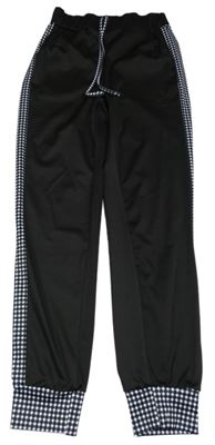 Černo-bílé sportovní tepláky se vzorovaným pruhem