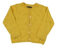 Tmavožltý prepínaci sveter s perforovanými srdiečkami PRIMARK