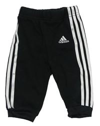 Černé tepláky s pruhy Adidas