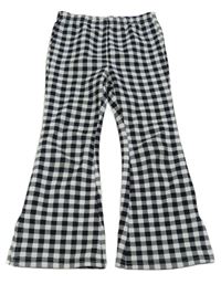 Čierno-biele kockované flare legíny Shein