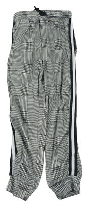 Sivo-biele kockované nohavice s prúžkami Shein