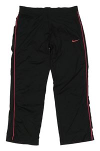 Černé capri funkční sportovní legíny s logem a pruhem Nike