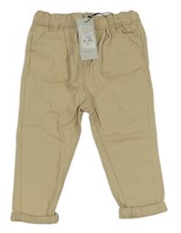 Nové - Béžové rifle s dúhou Primark