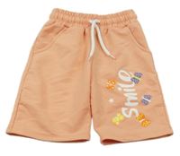 Svetloružové teplákové kraťasy s nápisom