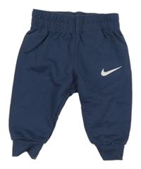 Tmavomodré tepláky Nike