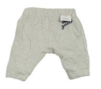 Nové - svetlosivé melírované turecké tepláky s nápismi M&S