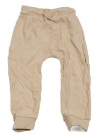 Svetloružové rebrované tepláky so cute