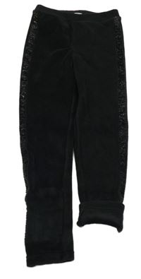 Černé plyšové zateplené legíny s třpytivým pruhem 