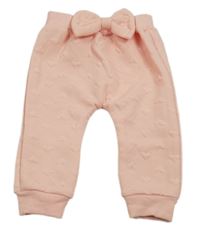 Svetloružové tepláky so srdiečkami a mašlou