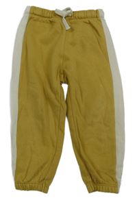 Medovo-bílé tepláky H&M