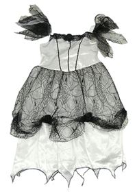 Kockovaným - Bielo-čierne šaty s čipkou s flitrami