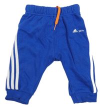 Safírové tepláky s pruhy Adidas 
