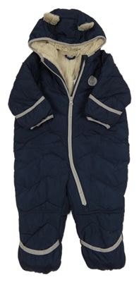 Tmavomodrá šusťáková prošívaná zimní kombinéza s kapucí Lupilu 