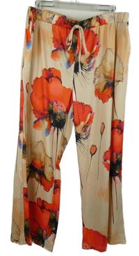 Dámske oranžové kvetované voľné é nohavice