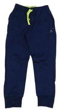 Tmavomodré sportovní funkční tepláky s logem Domyos