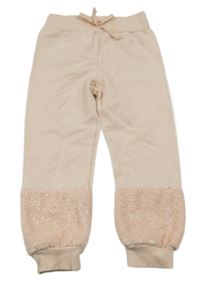 Světlebroskvové tepláky s mašlí a třpytivou kožešinou CIVIL