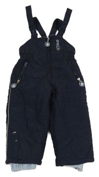 Tmavomodré šusťákové laclové oteplovačky s nápisem 