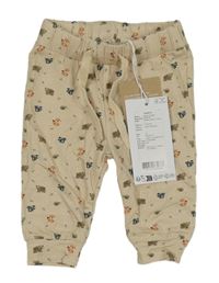Nové - Béžové tepláky so zvířaty Name it