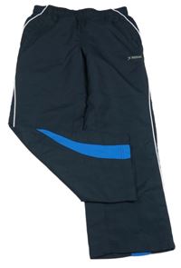 Tmavomodro-modré šusťákové sportovní kalhoty s logem a pruhem ROSSI