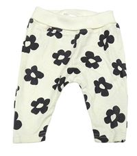 Smotanové kvetované tepláky Ergee