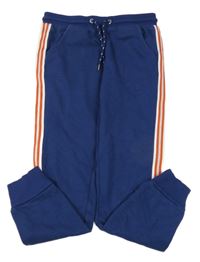 Tmavomodré tepláky červeno-bielým pruhom TCM